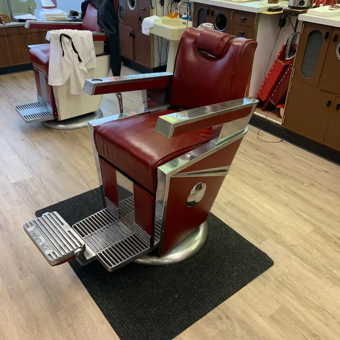 The shop’s classic red leather and chrome barber chair